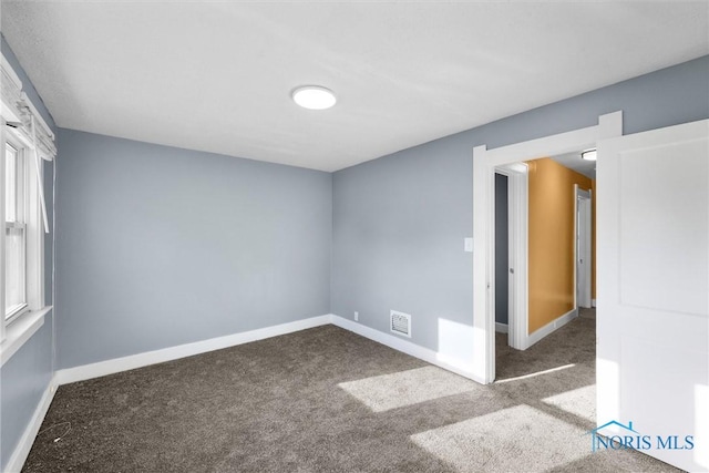 4242 Fairview Dr, Toledo, OH 43612 - carpeted empty room with baseboards