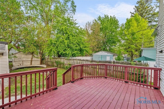 4242 Fairview Dr, Toledo, OH 43612 - wooden terrace featuring a fenced backyard