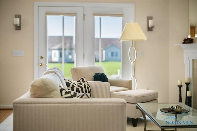 living room featuring baseboards