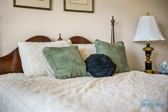 bedroom featuring attic access