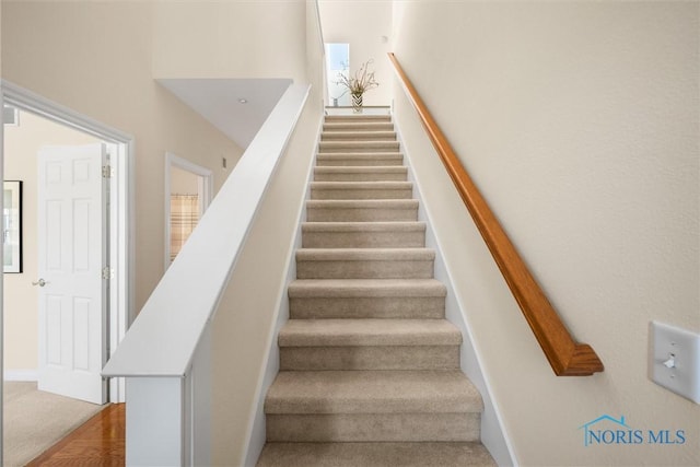 stairway with baseboards