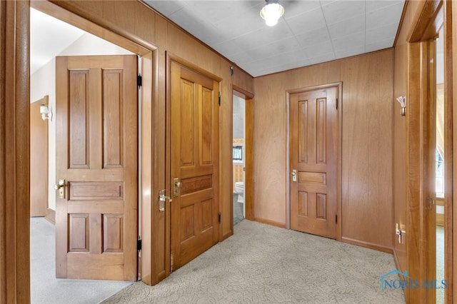 888 Columbus Ave, Fostoria, OH 44830 - carpeted foyer with baseboards and wooden walls