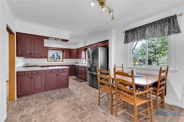 888 Columbus Ave, Fostoria, OH 44830 - kitchen with light countertops, appliances with stainless steel finishes, and a sink