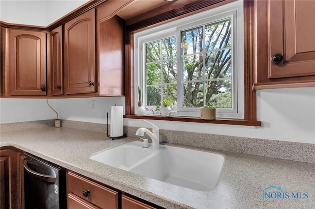 888 Columbus Ave, Fostoria, OH 44830 - kitchen with dishwashing machine and a sink