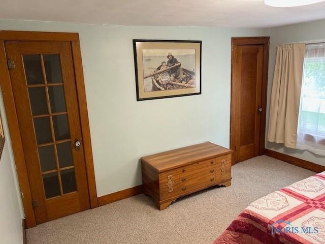 163 E Hull St, Edgerton, OH 43517 - bedroom with light carpet and baseboards