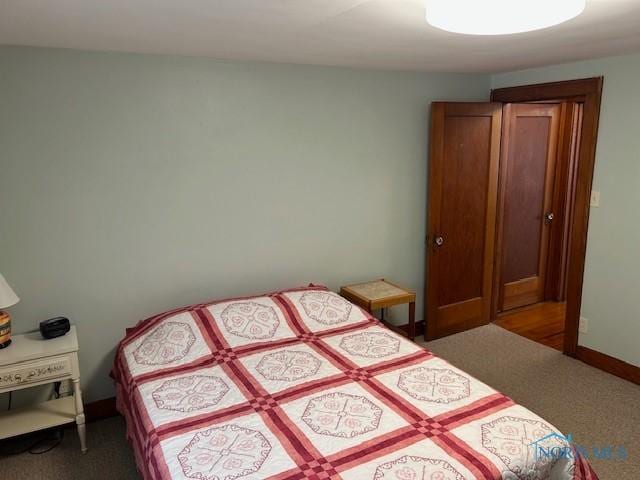 163 E Hull St, Edgerton, OH 43517 - bedroom featuring baseboards and carpet floors