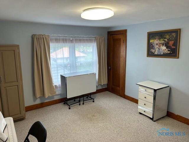 163 E Hull St, Edgerton, OH 43517 - office area with light carpet and baseboards