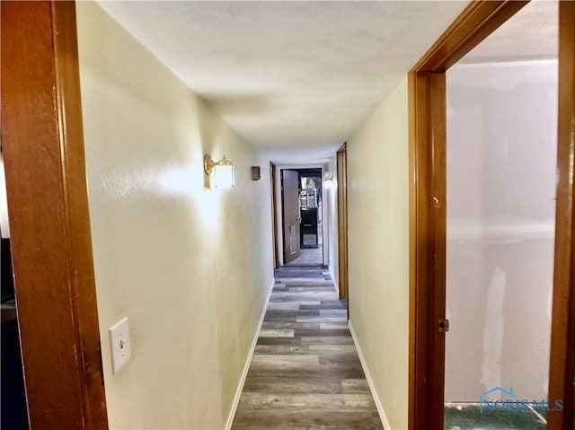 416 Donbar Dr, Bowling Green, OH 43402 - corridor featuring baseboards and wood finished floors