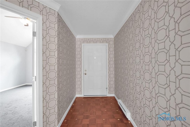corridor featuring baseboards, crown molding, baseboard heating, and wallpapered walls