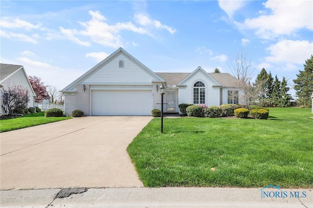 single story home with an attached garage, driveway, and a front lawn