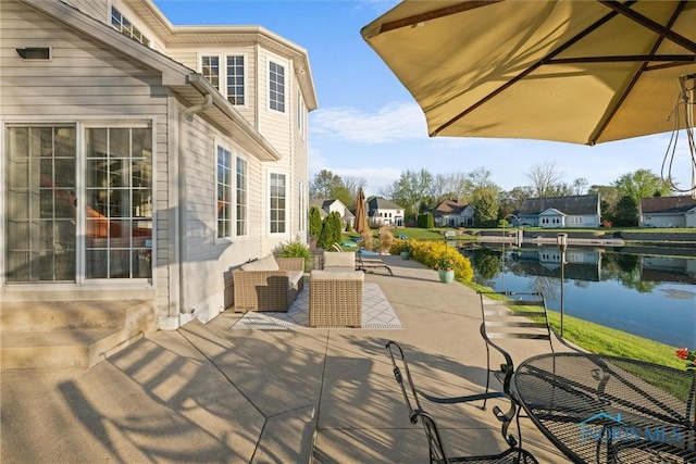 view of patio / terrace featuring a water view