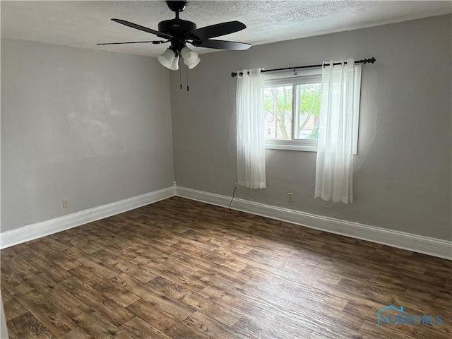 444 Rector Ave, Findlay, OH 45840 - empty room featuring wood finished floors, a textured ceiling, baseboards, and ceiling fan