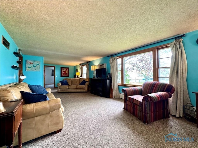 living room featuring carpet floors, a textured ceiling, and visible vents