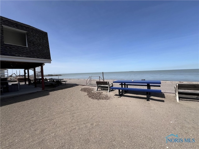 property view of water featuring a view of the beach