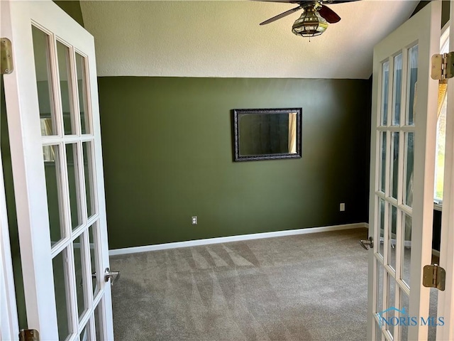 3518 Butz Rd, Maumee, OH 43537 - unfurnished room featuring french doors, carpet, ceiling fan, a textured ceiling, and baseboards