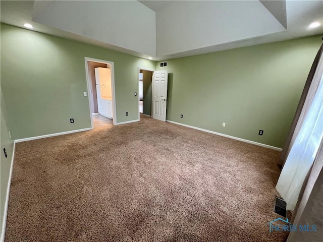 unfurnished bedroom with recessed lighting, carpet, baseboards, and visible vents
