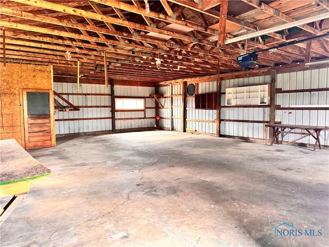 garage featuring a garage door opener