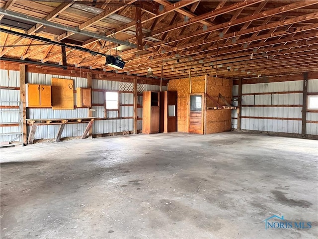 garage featuring a garage door opener