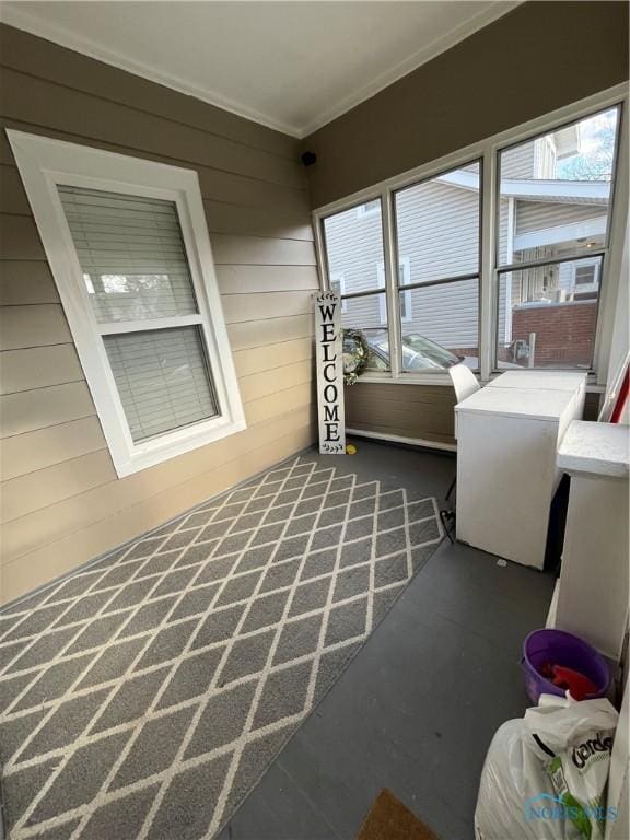 sunroom featuring a healthy amount of sunlight