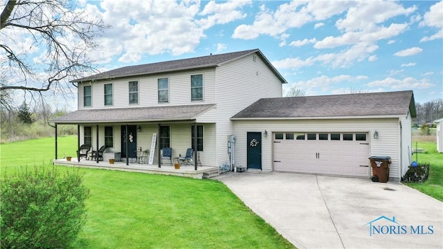 view of front of house featuring a garage, covered porch, driveway, and a front lawn