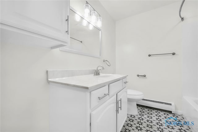 6040 Rolland Dr, Toledo, OH 43612 - bathroom with a baseboard heating unit, vanity, toilet, bathtub / shower combination, and baseboards