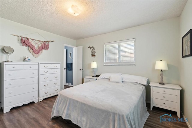 2123 Keen Ave, Toledo, OH 43611 - bedroom featuring dark wood-style flooring and a textured ceiling