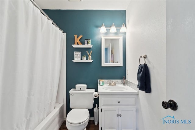 2123 Keen Ave, Toledo, OH 43611 - bathroom featuring toilet, shower / bathtub combination with curtain, and vanity
