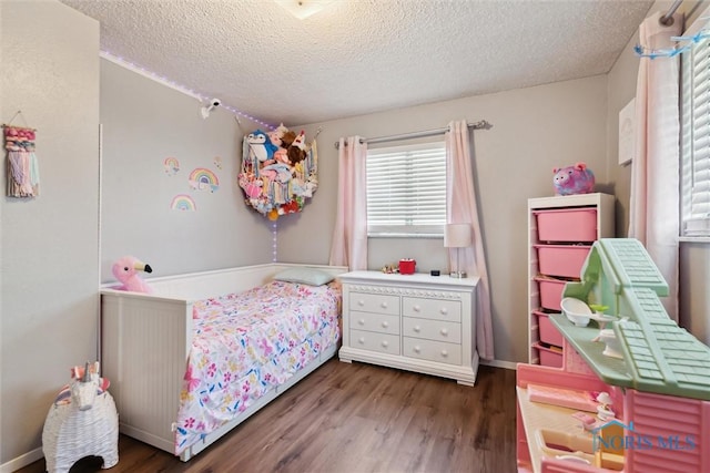 2123 Keen Ave, Toledo, OH 43611 - bedroom with a textured ceiling and wood finished floors