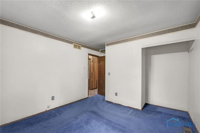 13921 Defiance Pike, Rudolph, OH 43462 - empty room with a textured ceiling and carpet