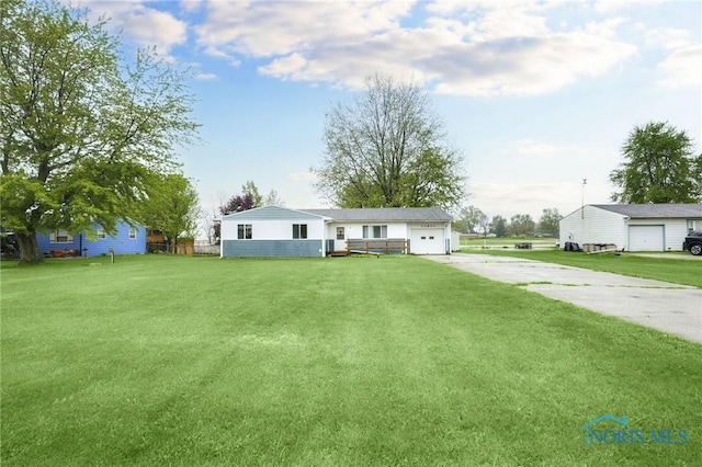 13921 Defiance Pike, Rudolph, OH 43462 - view of front of property with driveway and a front lawn