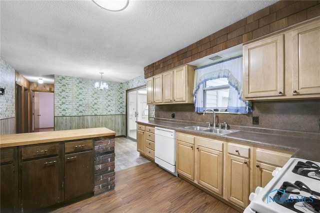 13921 Defiance Pike, Rudolph, OH 43462 - kitchen with white appliances, a sink, wallpapered walls, a textured ceiling, and a wainscoted wall