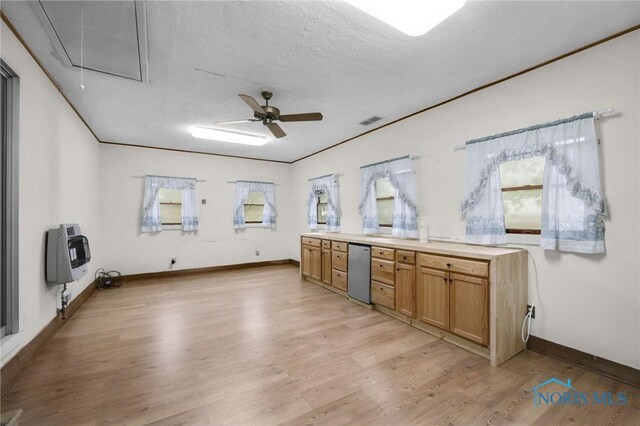 13921 Defiance Pike, Rudolph, OH 43462 - interior space featuring plenty of natural light, light wood-style flooring, ceiling fan, baseboards, and a textured ceiling