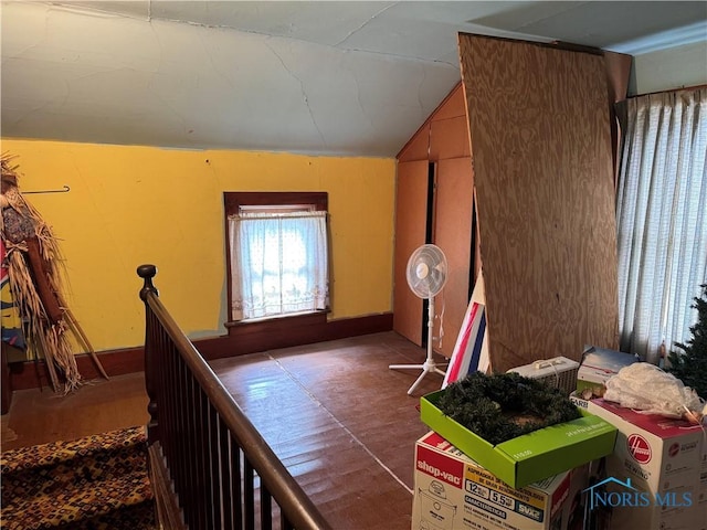 interior space featuring lofted ceiling