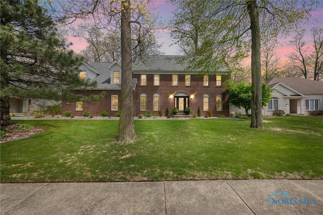 1135 Pimlico Park, Holland, OH 43528 - view of front facade featuring a lawn and brick siding