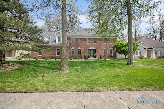 1135 Pimlico Park, Holland, OH 43528 - colonial home with brick siding and a front yard