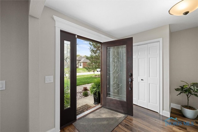 1135 Pimlico Park, Holland, OH 43528 - entryway with baseboards and wood finished floors