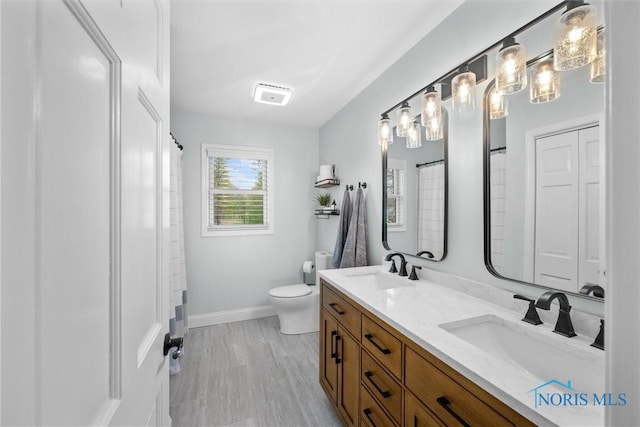 1135 Pimlico Park, Holland, OH 43528 - full bath with a sink, baseboards, toilet, and double vanity