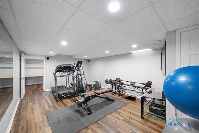 1135 Pimlico Park, Holland, OH 43528 - exercise area featuring baseboards, recessed lighting, a paneled ceiling, and wood finished floors