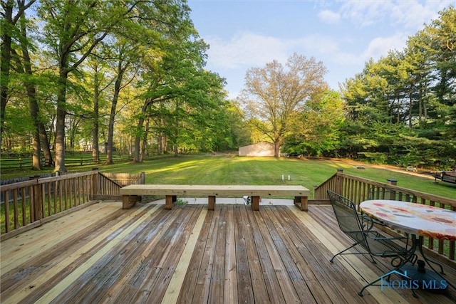 2515 S Berkey Southern Rd, Swanton, OH 43558 - wooden deck with a lawn and view of scattered trees