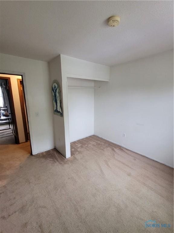 633 Southfield Dr, Maumee, OH 43537 - unfurnished bedroom featuring carpet floors and a closet