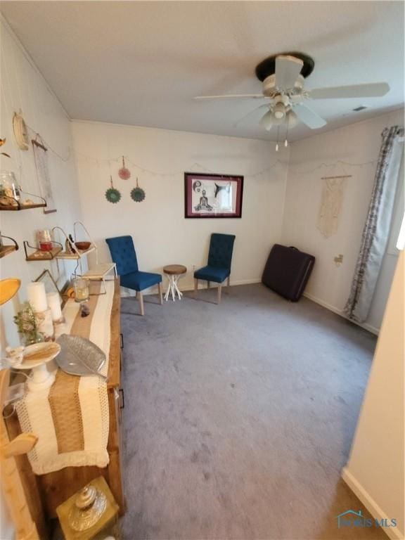 633 Southfield Dr, Maumee, OH 43537 - sitting room with ceiling fan, carpet floors, and baseboards