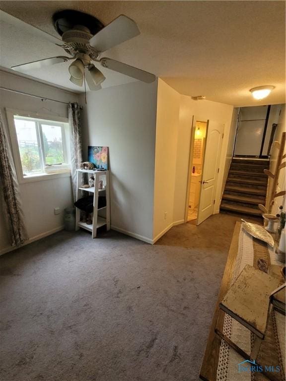 633 Southfield Dr, Maumee, OH 43537 - living room featuring stairs, carpet floors, a ceiling fan, and baseboards