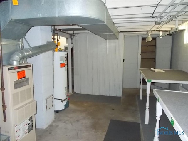 basement featuring water heater