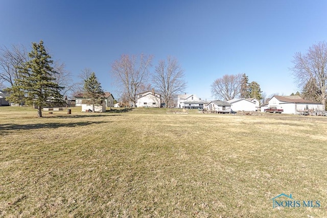 view of yard with a residential view