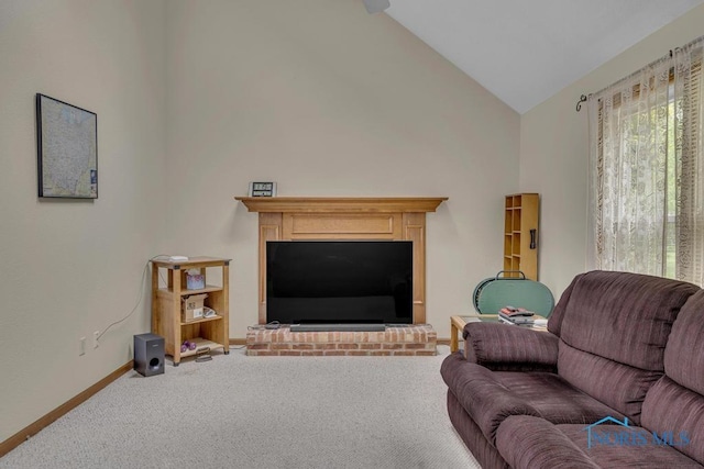 3739 Wild Pheasant Ln, Sylvania, OH 43560 - carpeted living room with a fireplace, baseboards, and high vaulted ceiling