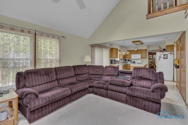 3739 Wild Pheasant Ln, Sylvania, OH 43560 - living room featuring high vaulted ceiling and a ceiling fan