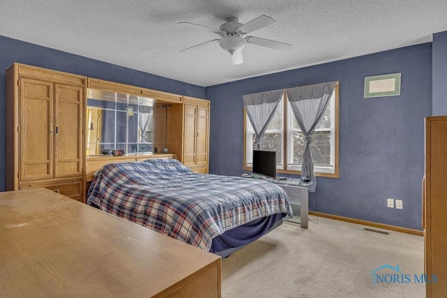 3739 Wild Pheasant Ln, Sylvania, OH 43560 - bedroom with carpet flooring, baseboards, a textured ceiling, and ceiling fan