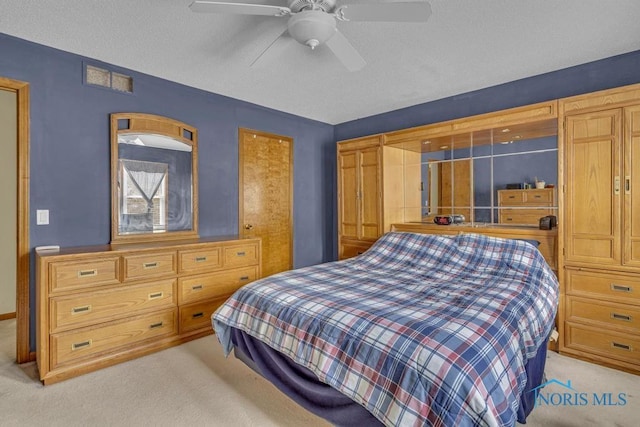 3739 Wild Pheasant Ln, Sylvania, OH 43560 - bedroom featuring light colored carpet and a ceiling fan