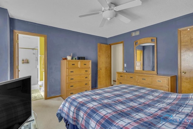 3739 Wild Pheasant Ln, Sylvania, OH 43560 - carpeted bedroom featuring ceiling fan, ensuite bath, and baseboards
