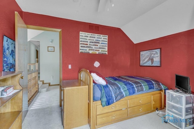 3739 Wild Pheasant Ln, Sylvania, OH 43560 - bedroom featuring carpet floors, vaulted ceiling, and a ceiling fan